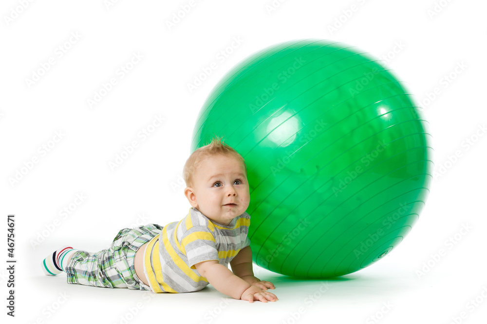 sweet small baby with fitness ball on a white background. sweet small baby with fitness ball on a white background.