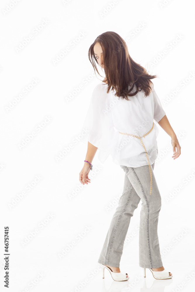 real young beautiful woman walking and looking backside real young beautiful woman walking and looking backside