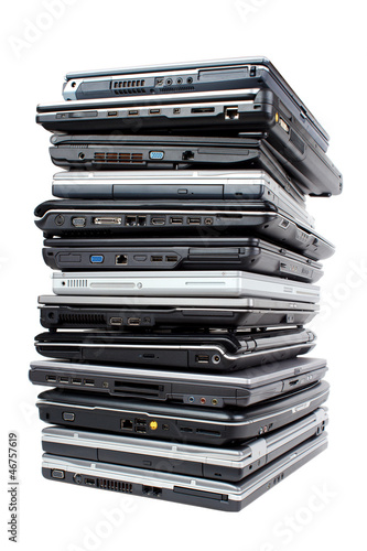 Obraz na płótnie Pile of old used laptop computers for recycling w salonie