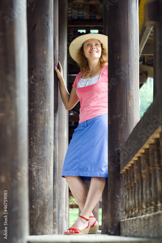 Attractive smiling women on the bridge. Beauty wearing