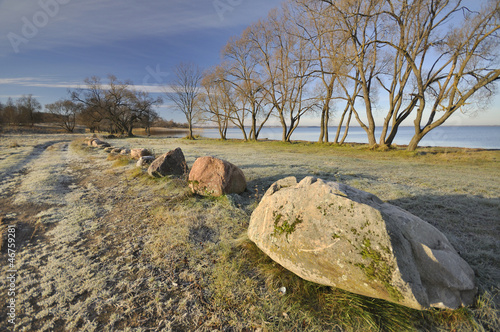 stones on lake beach photo