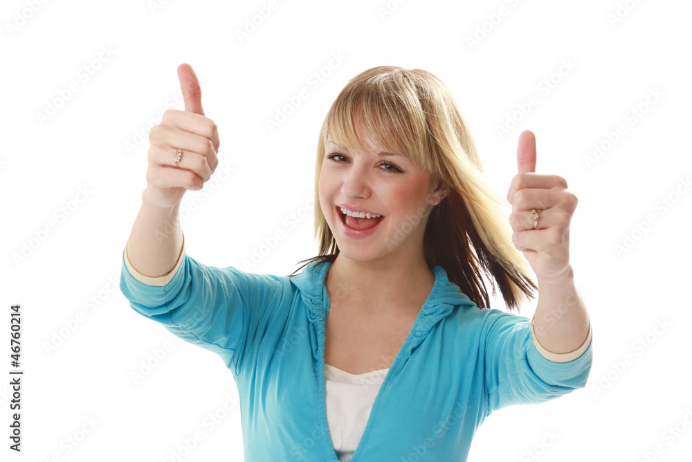 Excited young woman showing thumbs up isolated Excited young woman showing thumbs up isolated
