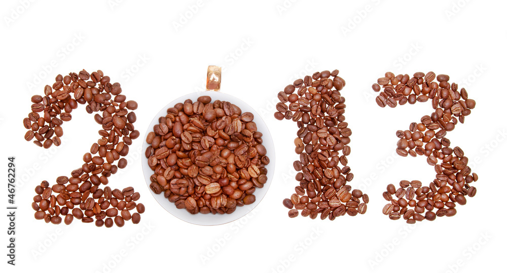 New Year 2013 made of coffee beans and cup on the white backgrou New Year 2013 made of coffee beans and cup on the white backgrou
