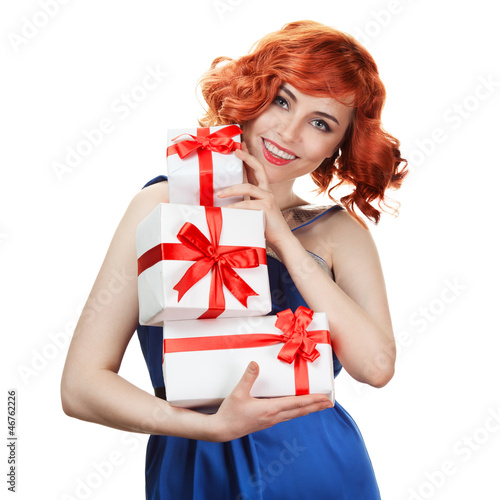 Young happy woman with a gift. Isolated over white