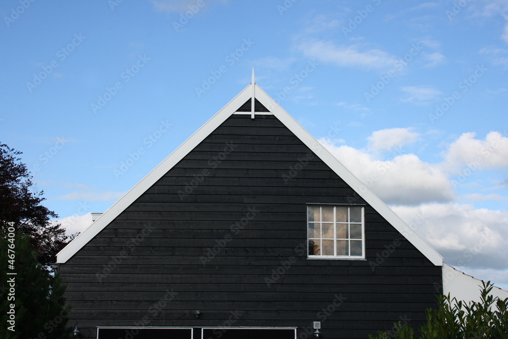 An approved proposed with black shingles gable