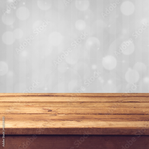 Winter bokeh background with wooden table