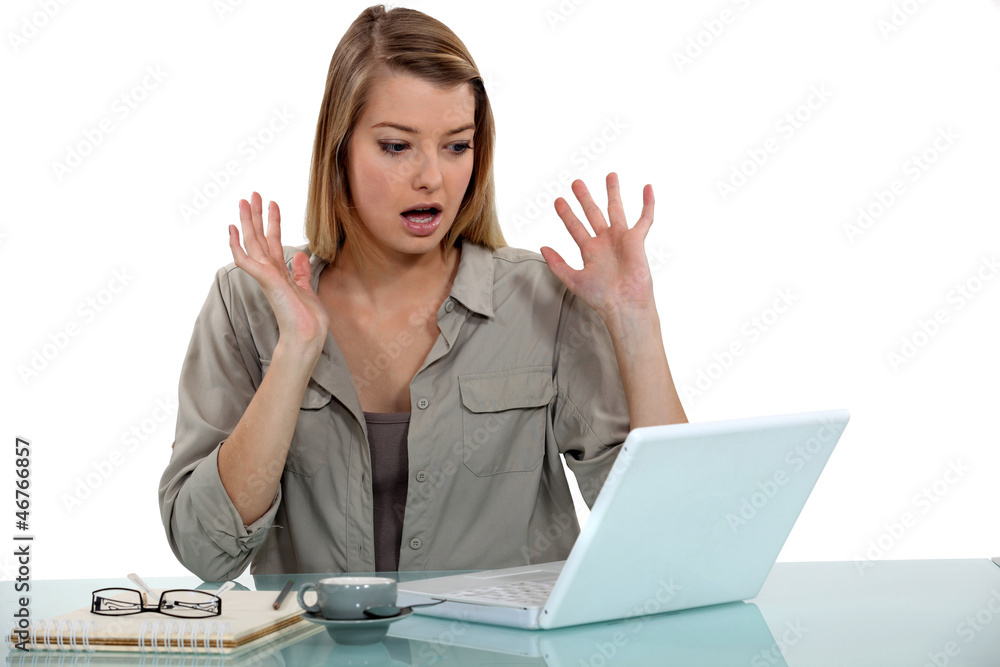 working on her laptop