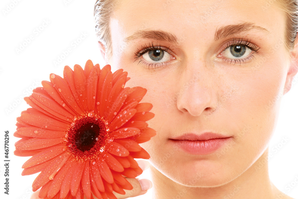 A beautiful young woman with a flower, isolated on white A beautiful young woman with a flower, isolated on white