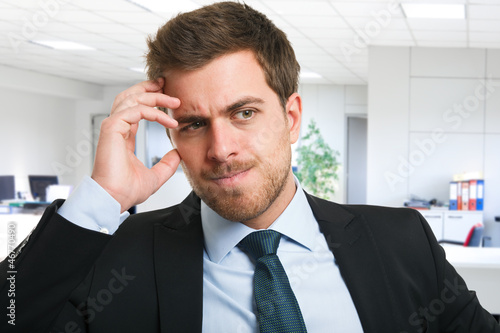 Fotografie Pensive businessman