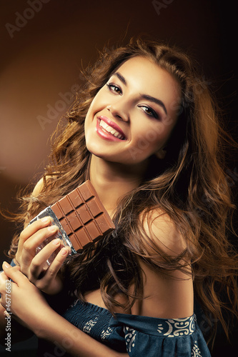 smiling woman and chocolate bar