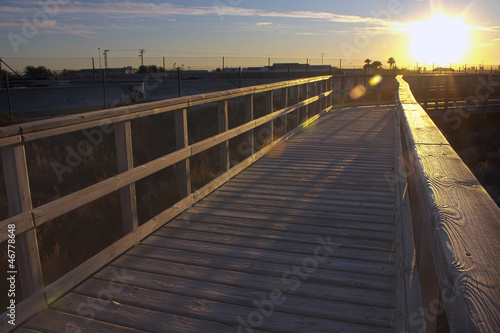 Boardwalk to Winter Beach at sunset