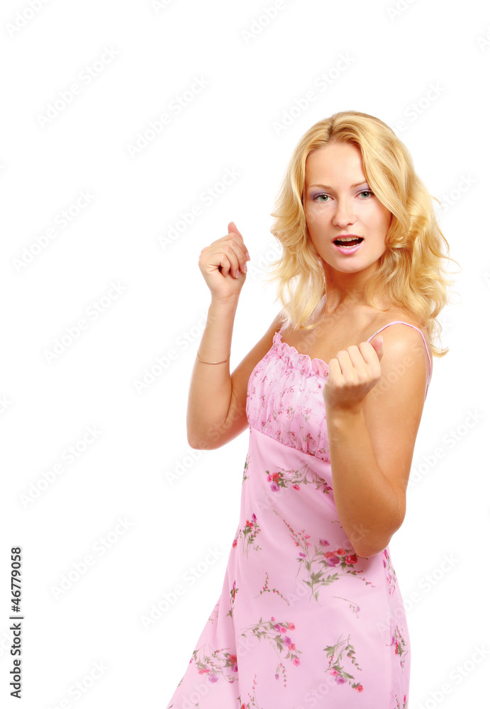 A young woman with something in her fists A young woman with something in her fists
