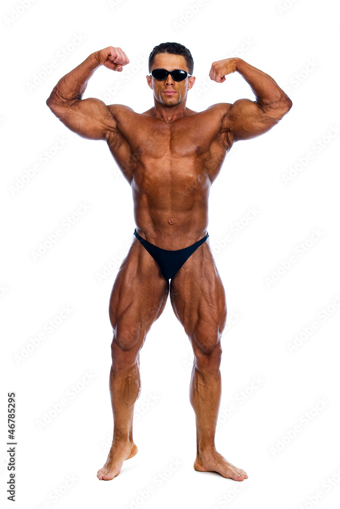 Bodybuilder showing his muscles Bodybuilder showing his muscles