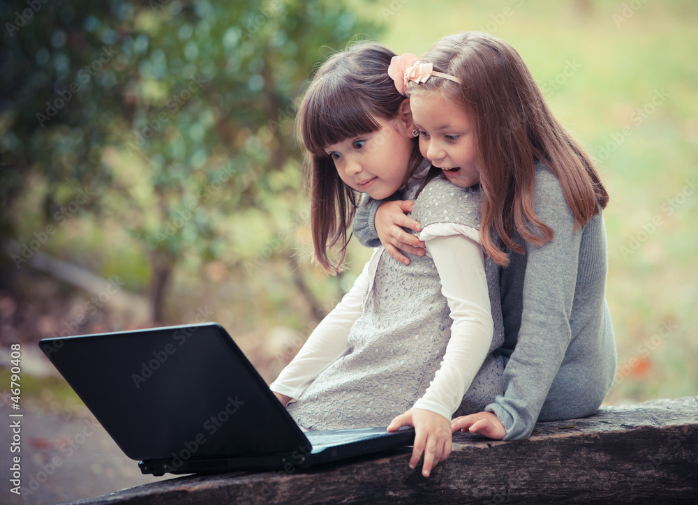 girlfriend in autumn park with laptop girlfriend in autumn park with laptop