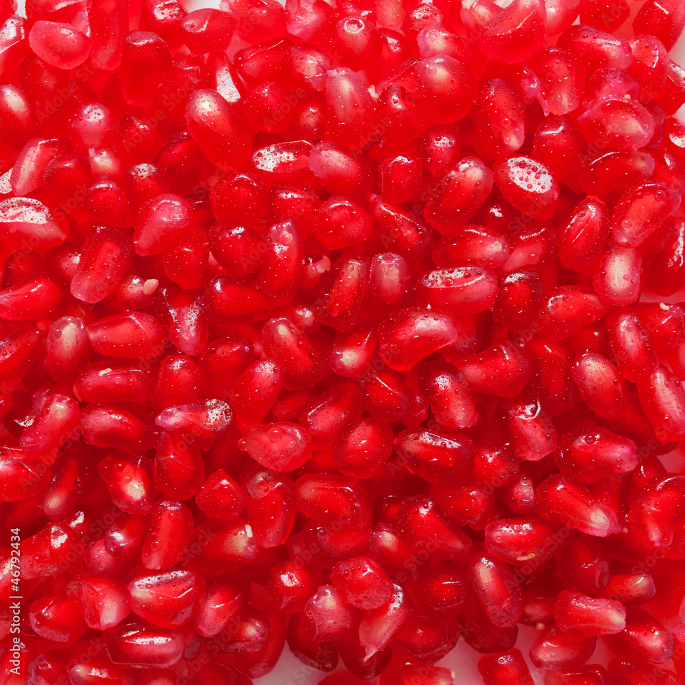 Pomegranate seeds as a food background or texture Pomegranate seeds as a food background or texture