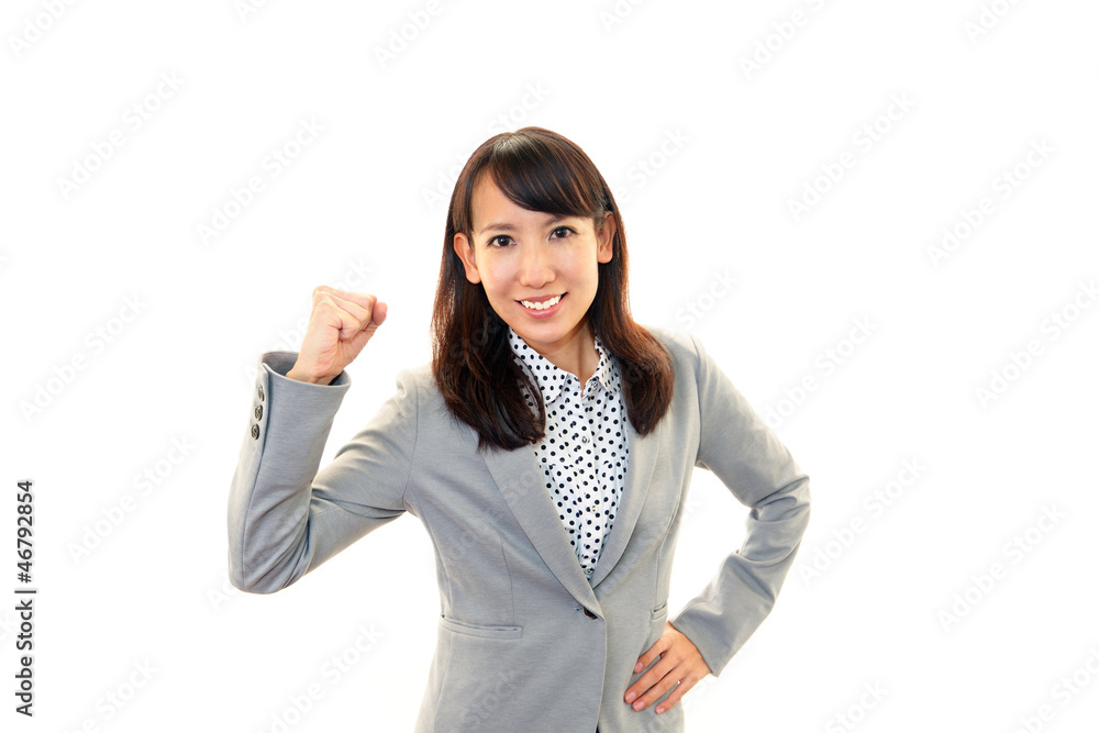 Obraz premium ガッツポーズをする美しい女性実業家