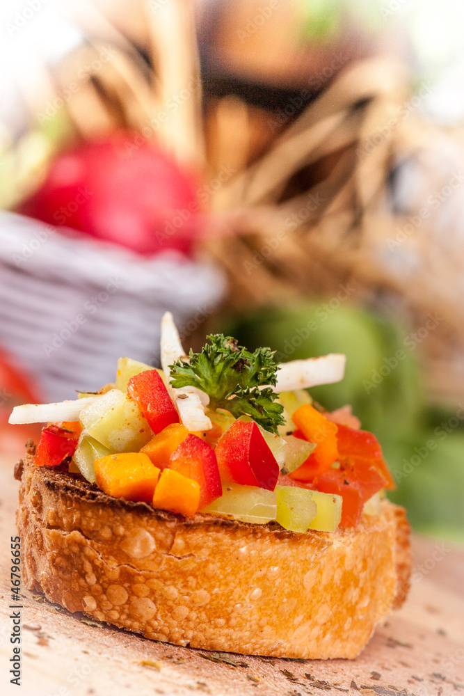 italian bruschetta with red and yellow peppers