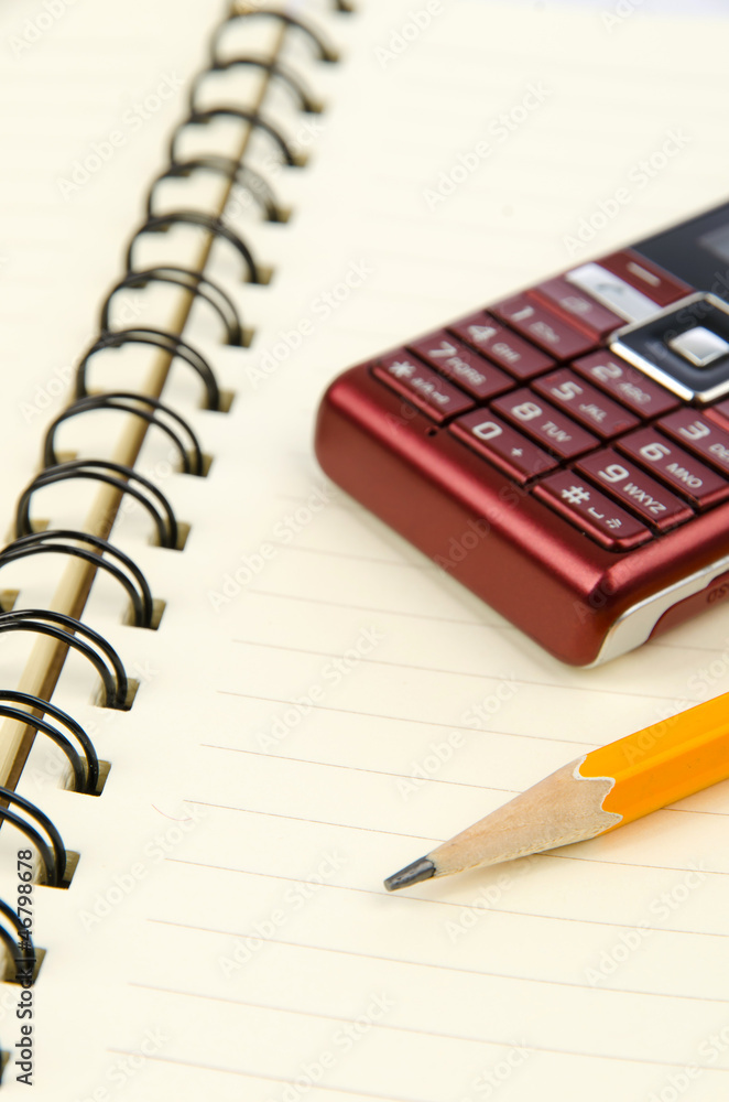 Pencil and notepad with mobile phone Pencil and notepad with mobile phone