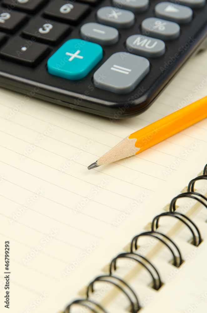 Pencil and notepad with calculator