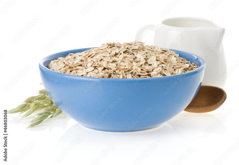 bowl of oat flake on white bowl of oat flake on white
