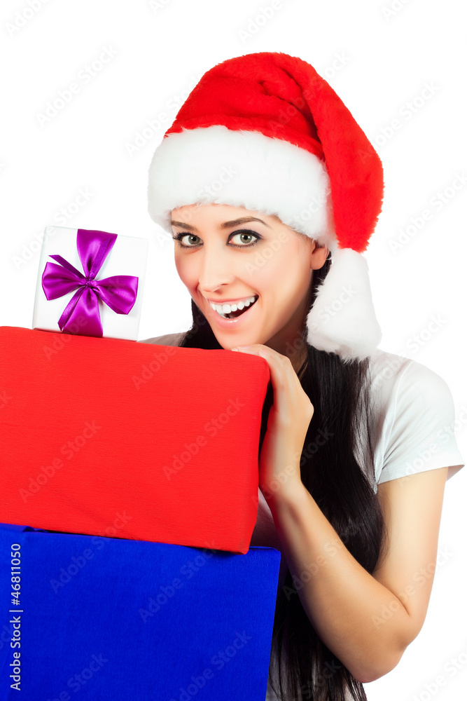 happy woman in a Santa Claus hat with lots of gifts happy woman in a Santa Claus hat with lots of gifts