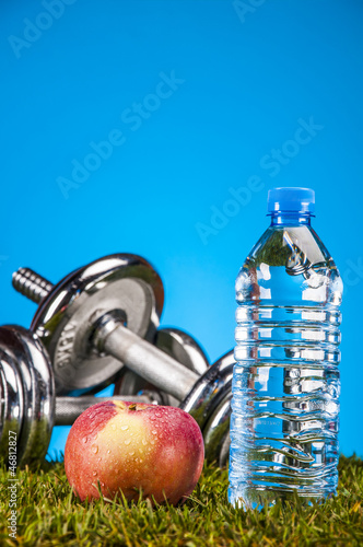 Fitness stuff with light background and friuts