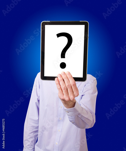 Businessman holding digital tablet with question