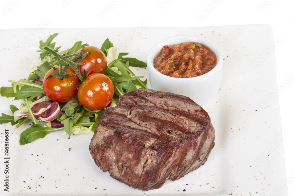 Grilled Beef Steak Isolated On a White Background Grilled Beef Steak Isolated On a White Background