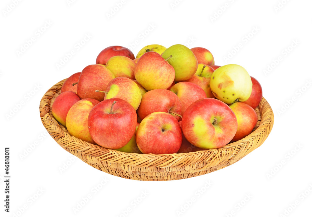Red apple in a wattled basket, isolated on white background Red apple in a wattled basket, isolated on white background