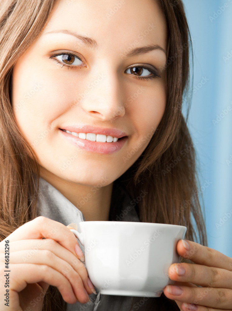 Cheerful smiling business woman with coffee Cheerful smiling business woman with coffee