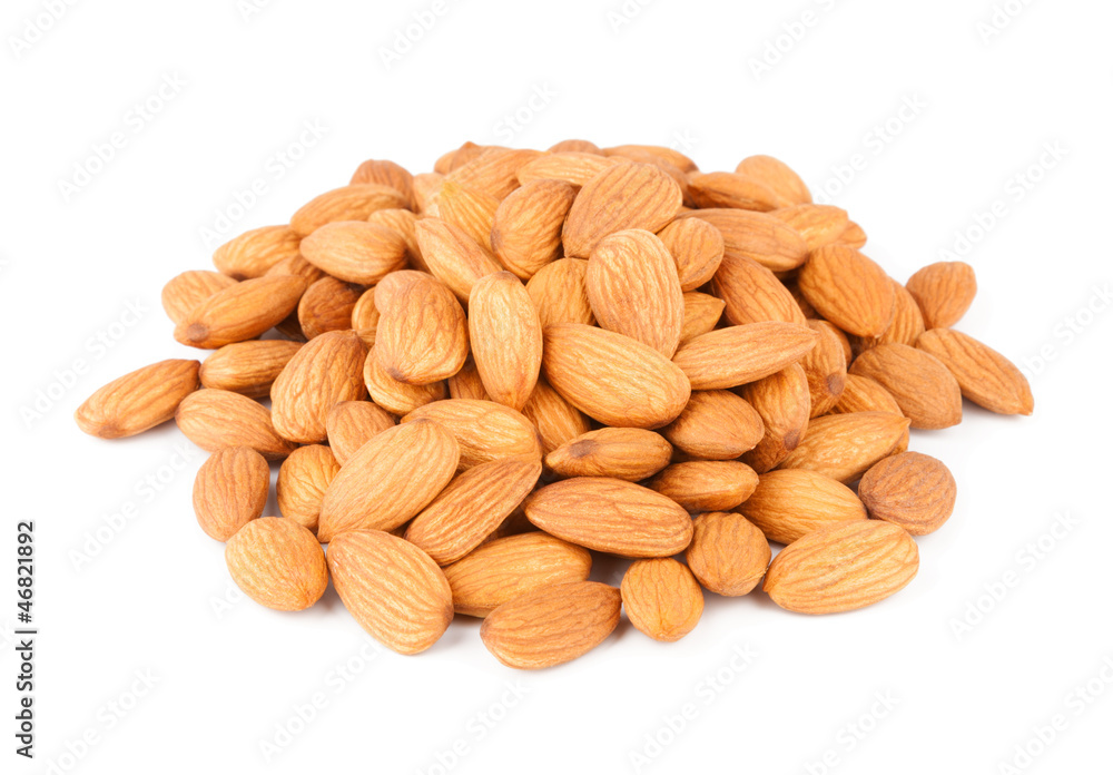 A handful of dried almonds isolated on white background A handful of dried almonds isolated on white background