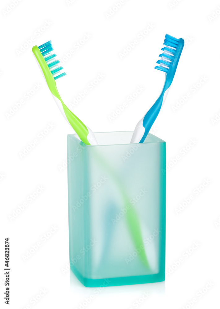 Two multicolored toothbrushes Two multicolored toothbrushes