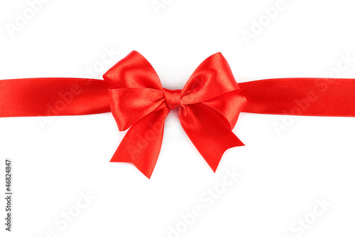Big red holiday bow on white background