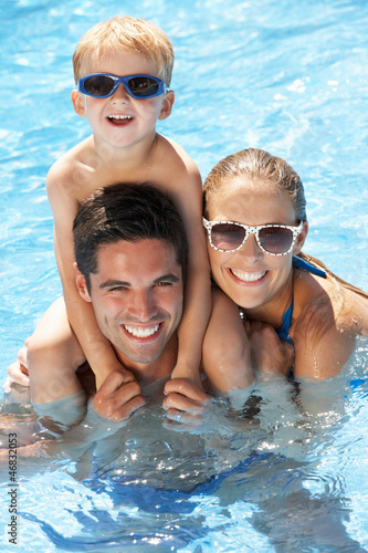 Family Having Fun In Swimming Pool © Monkey Business