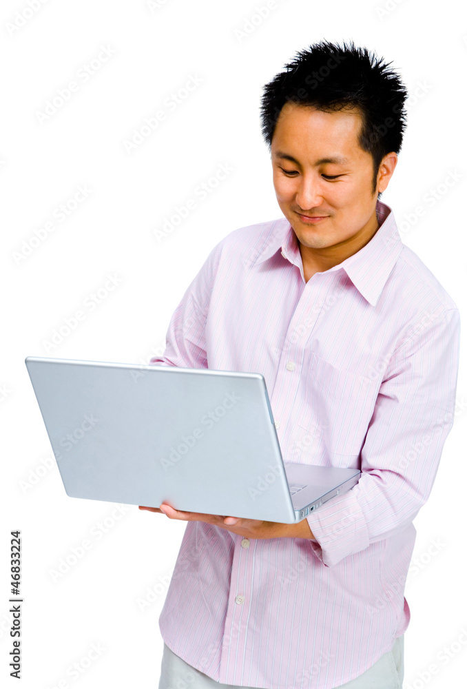 Smiling man using a laptop Smiling man using a laptop