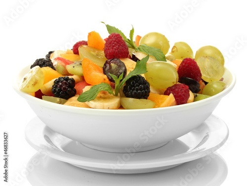 fresh fruits salad in bowl  isolated on white