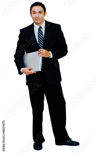 Happy businessman holding laptop