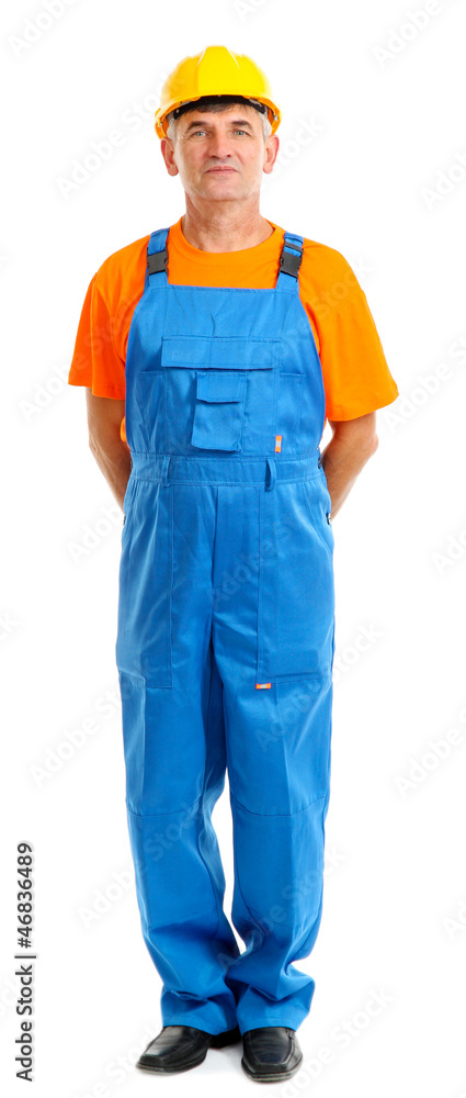 Male builder in yellow helmet isolated on white Male builder in yellow helmet isolated on white