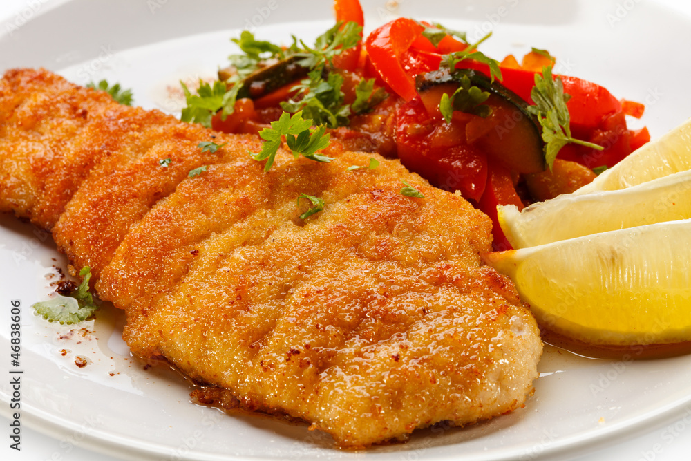Fried chicken fillets and vegetables Fried chicken fillets and vegetables