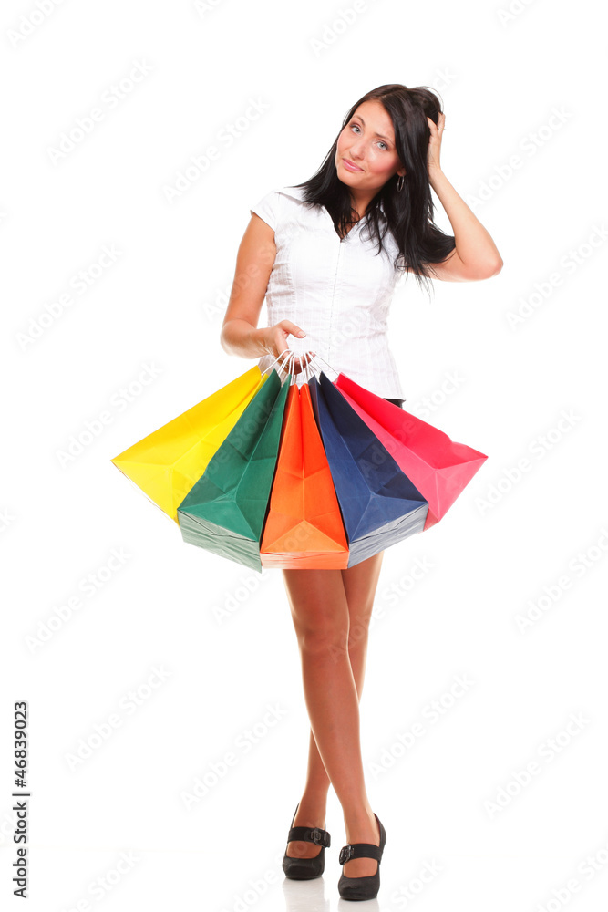Full length of happy young lady shopping bags against isolated Full length of happy young lady shopping bags against isolated