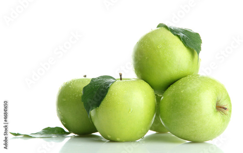 Ripe green apples with leaves  isolated on white