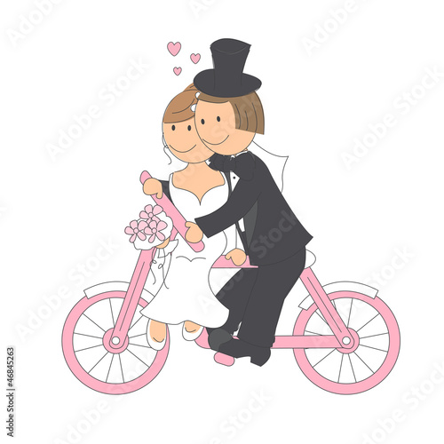 Wedding couple ride on a bicycle