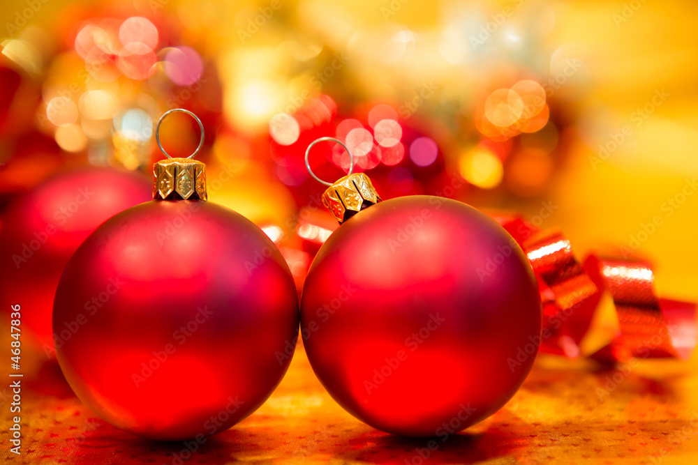 Red Christmas balls on a gold background Red Christmas balls on a gold background