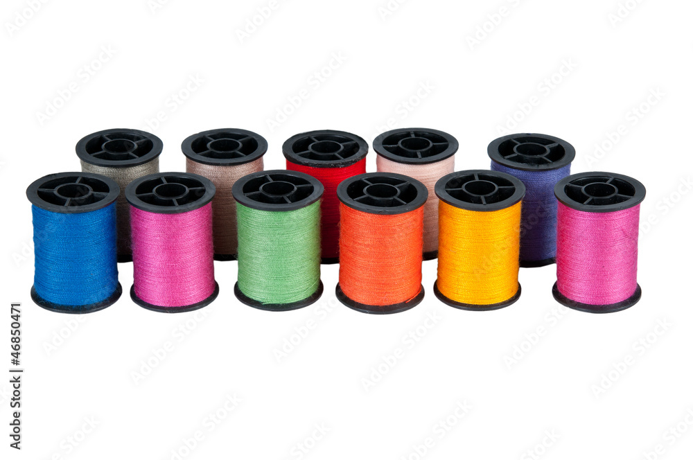 set of color threads on a white background set of color threads on a white background