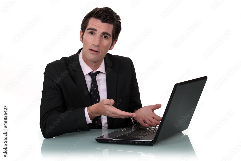 Man demonstrating a laptop