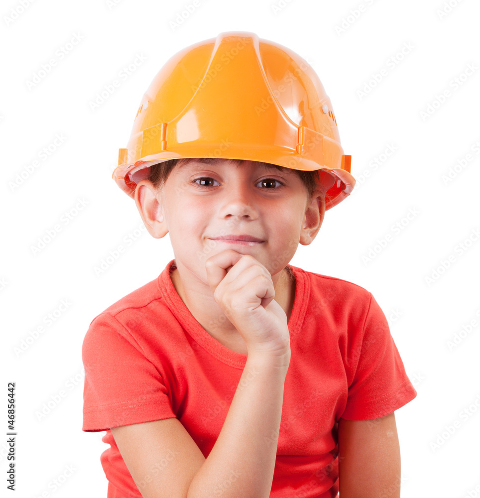 Girl in a protective helmet sits Girl in a protective helmet sits