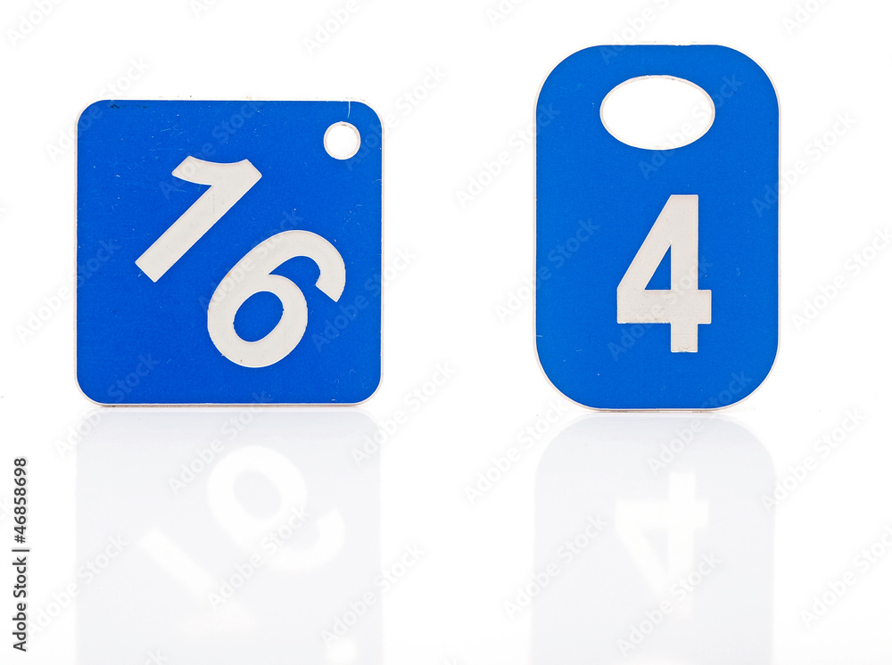 two blue plastic label with digit on white two blue plastic label with digit on white