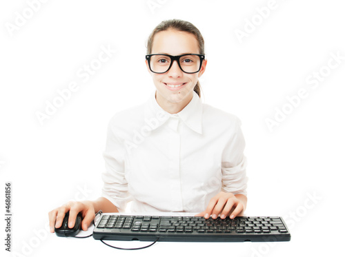 Young student with computer keyboard and mouse
