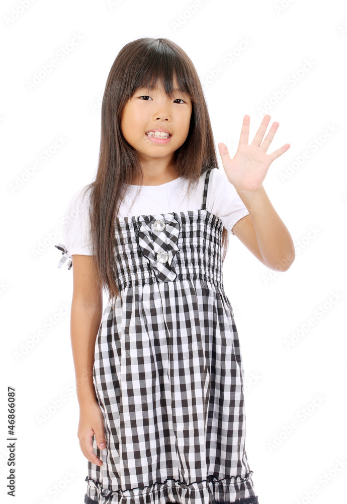 Smiling little asian girl showing her hand up Smiling little asian girl showing her hand up