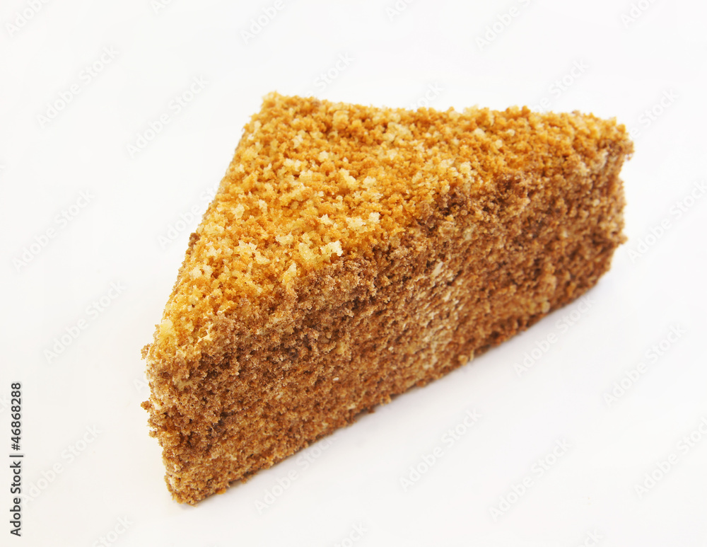 Triangular cake covered with chocolate chips Triangular cake covered with chocolate chips